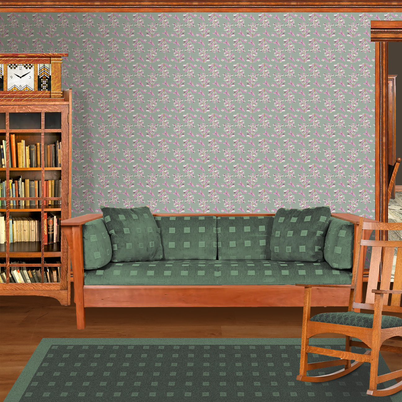 The artwork features a repeating pattern of large, stylized flowers and leaves in shades of pink and lavender against a rich sage background. The flowers have elongated petals and leaves with intricate vein details, while the butterflies exhibit delicate wing shapes with matching color tones. Soft white floral accents complement the design, creating a harmonious and elegant botanical motif. The wallpaper design is shown in a Mission style living room