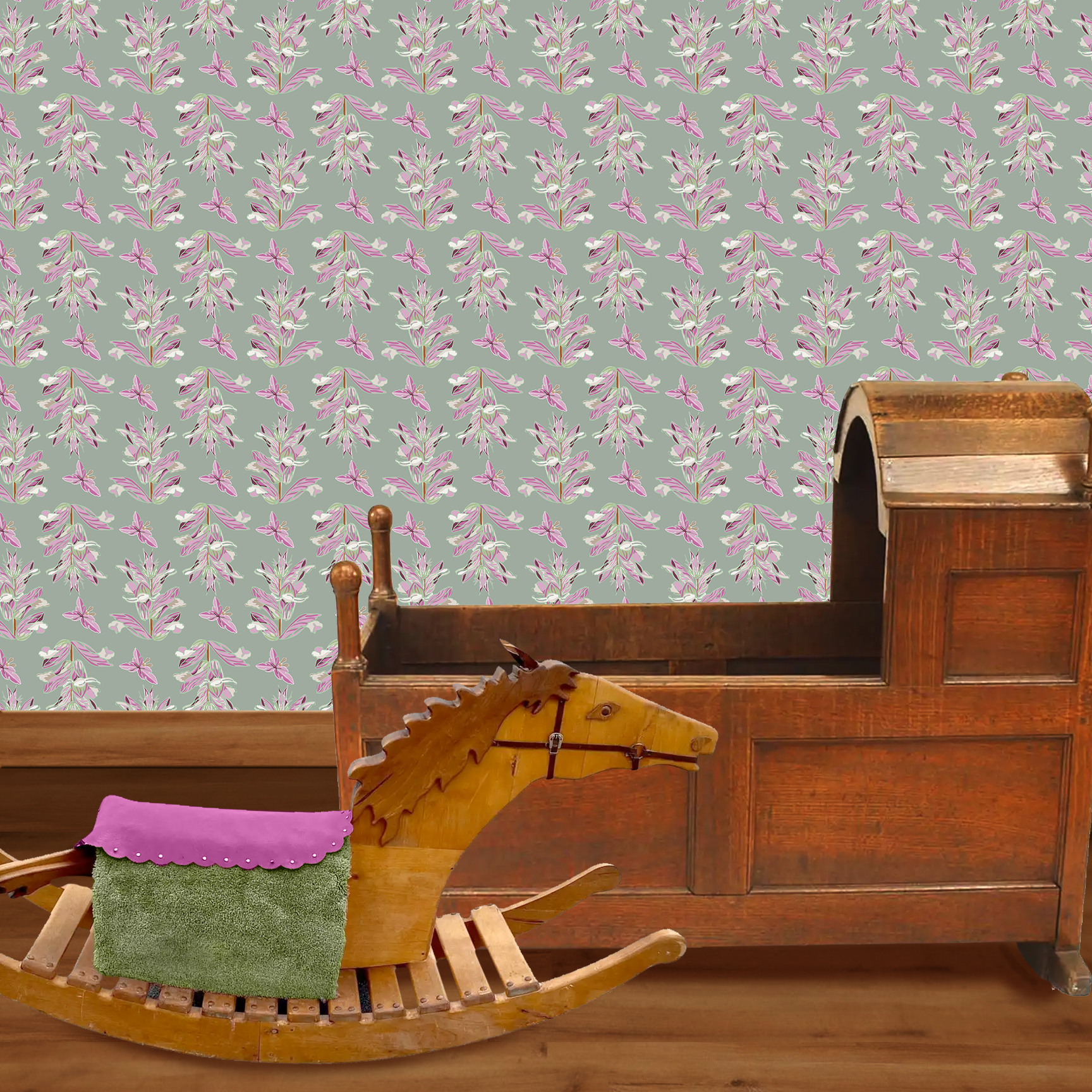 The artwork features a repeating pattern of large, stylized flowers and leaves in shades of pink and lavender against a rich sage background. The flowers have elongated petals and leaves with intricate vein details, while the butterflies exhibit delicate wing shapes with matching color tones. Soft white floral accents complement the design, creating a harmonious and elegant botanical motif. The wallpaper design is shown in a Mission style nursery.