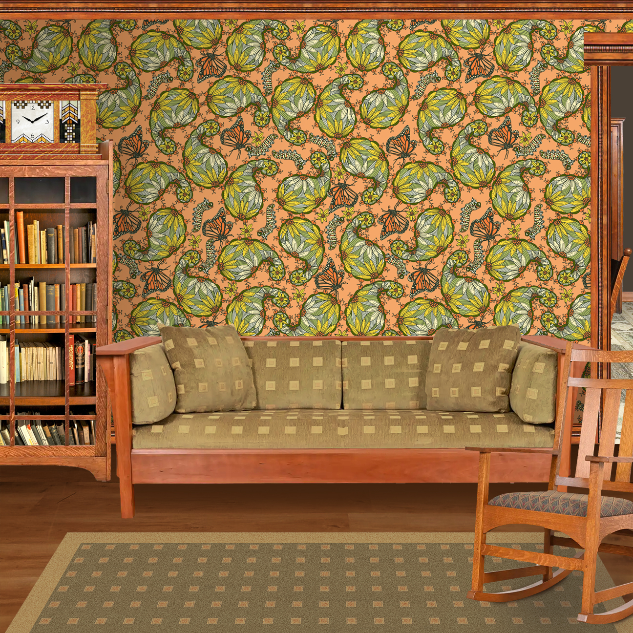The artwork features a dense, seamless pattern composed of intricately detailed butterflies, caterpillars, and flowers. The butterflies are primarily orange with black and white accents, conveying a monarch butterfly design. The caterpillars are segmented and textured with earthy tones of green and beige, blending naturally with the floral elements. The flowers have petals colored in shades of pale pink and green, with leaves interspersed throughout the composition. The background is a light, muted yellow, which enhances the vibrant colors of the butterflies and floral motifs. The overall design is highly decorative and organic, showcasing a lyrical interplay between the stages of a butterfly's life cycle and plant life. The wallpaper design is shown in a Mission style living room