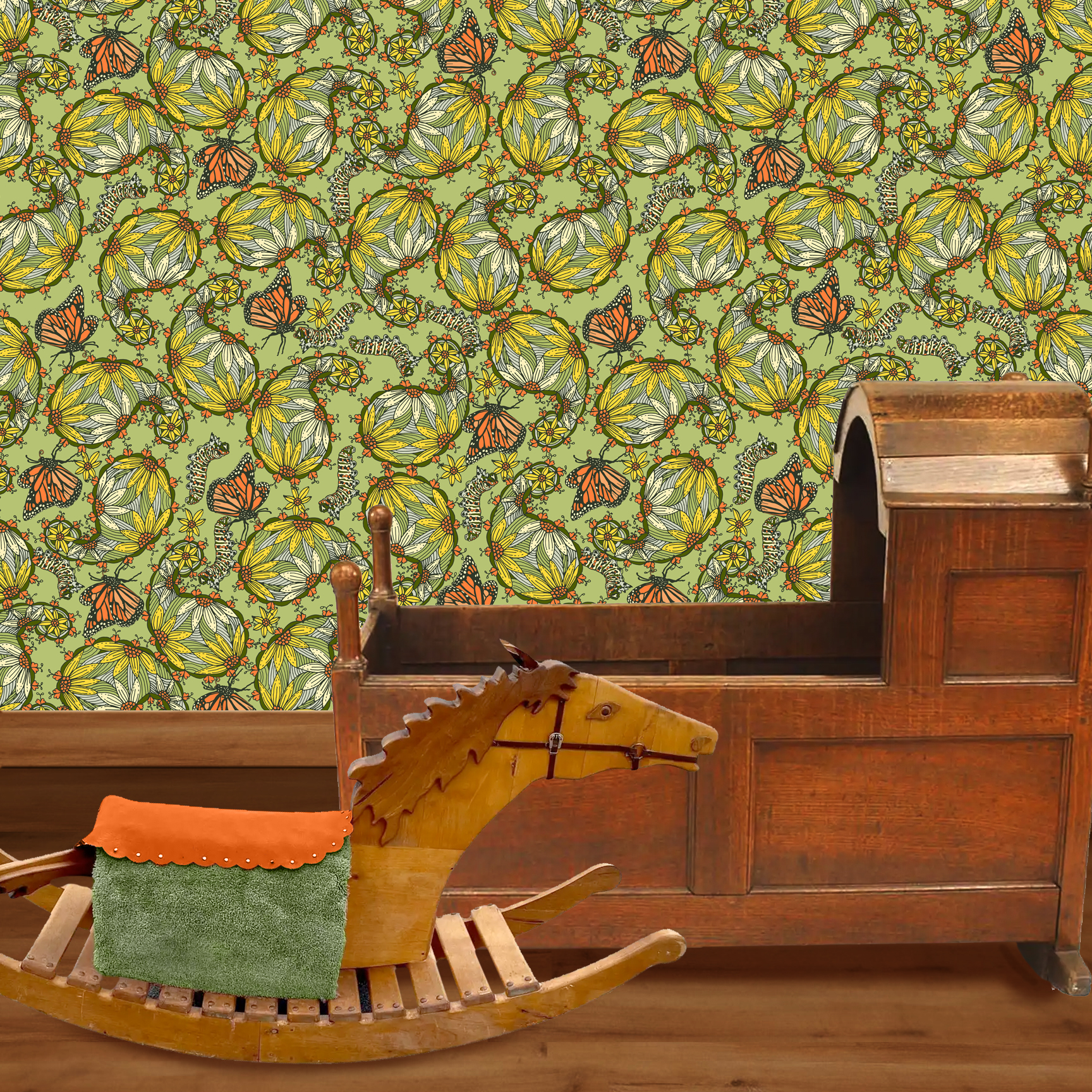 The artwork features a dense, seamless pattern composed of intricately detailed butterflies, caterpillars, and flowers. The butterflies are primarily orange with black and white accents, conveying a monarch butterfly design. The caterpillars are segmented and textured with earthy tones of green and beige, blending naturally with the floral elements. The flowers have petals colored in shades of pale pink and green, with leaves interspersed throughout the composition. The background is a light, muted yellow, which enhances the vibrant colors of the butterflies and floral motifs. The overall design is highly decorative and organic, showcasing a lyrical interplay between the stages of a butterfly's life cycle and plant life. The wallpaper design is shown in a Mission style nursery.