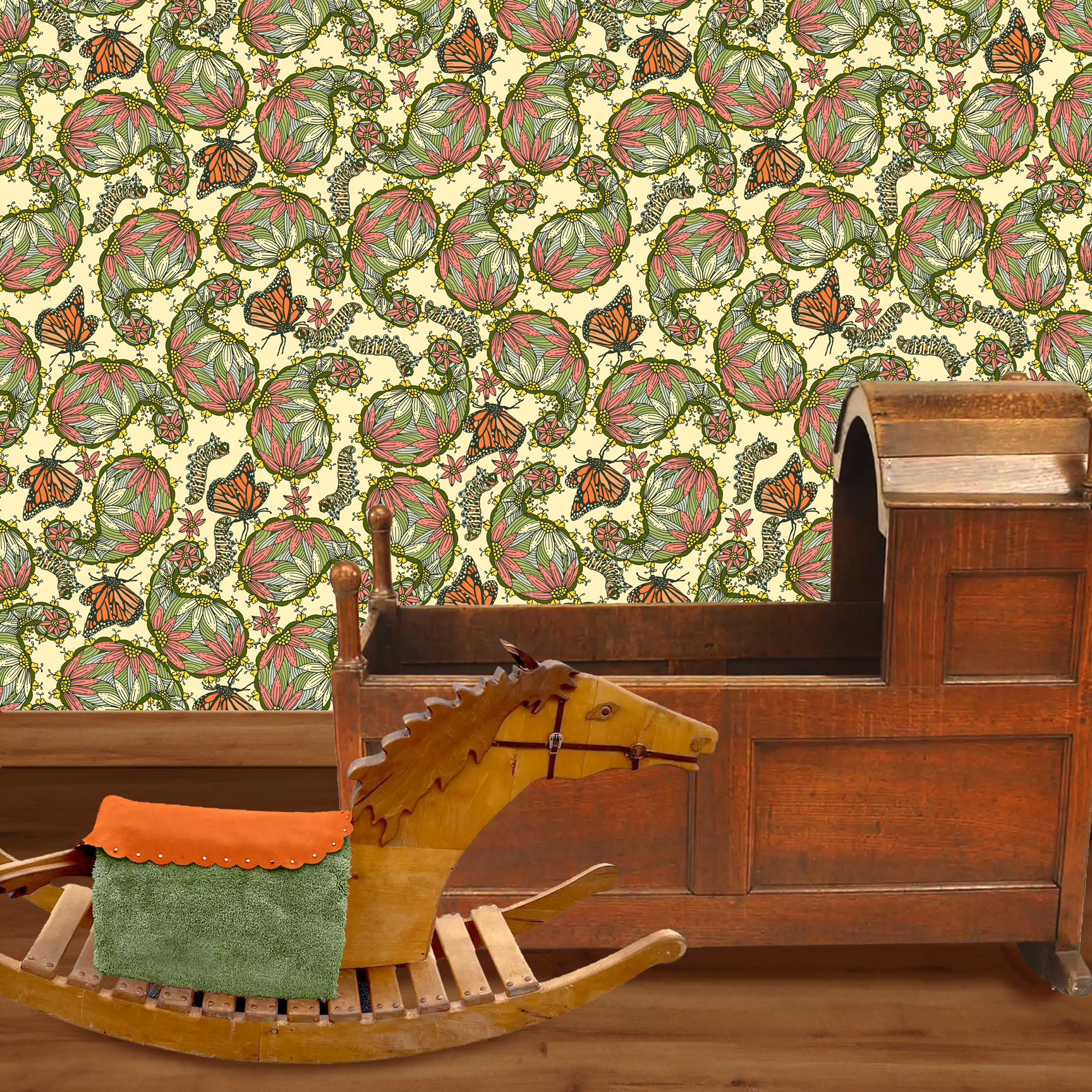 The artwork features a dense, seamless pattern composed of intricately detailed butterflies, caterpillars, and flowers. The butterflies are primarily orange with black and white accents, conveying a monarch butterfly design. The caterpillars are segmented and textured with earthy tones of green and beige, blending naturally with the floral elements. The flowers have petals colored in shades of pale pink and green, with leaves interspersed throughout the composition. The background is a light, muted yellow, which enhances the vibrant colors of the butterflies and floral motifs. The overall design is highly decorative and organic, showcasing a lyrical interplay between the stages of a butterfly's life cycle and plant life. The wallpaper design is shown in a Mission style nursery.