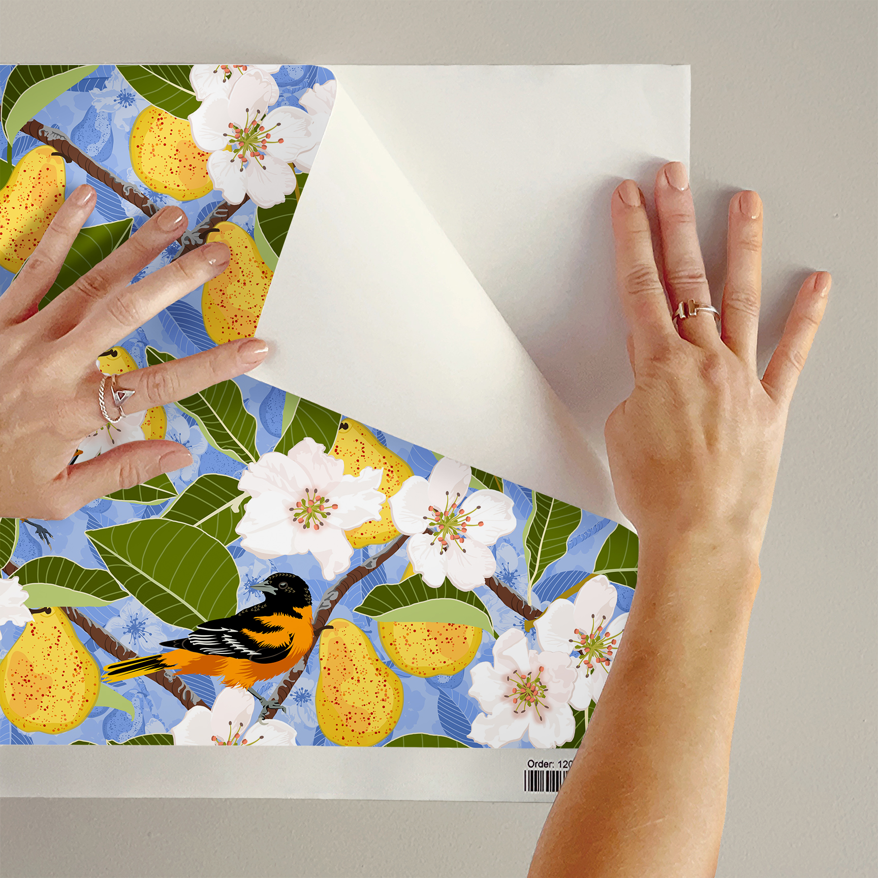 The artwork showcases a vibrant and detailed pattern featuring three orange and black birds set against a backdrop of yellow pears, green leaves, and white blossoms. The birds are depicted in different poses: one perched on a branch, one in mid-flight with wings spread, and another near a pear. The rich colors and intricate details of the feathers, fruits, and flowers create a lively and harmonious composition. The overall style combines naturalistic elements with a decorative, repeating design, highlighting the beauty of nature with emphasis on bold contrasts and vivid hues.