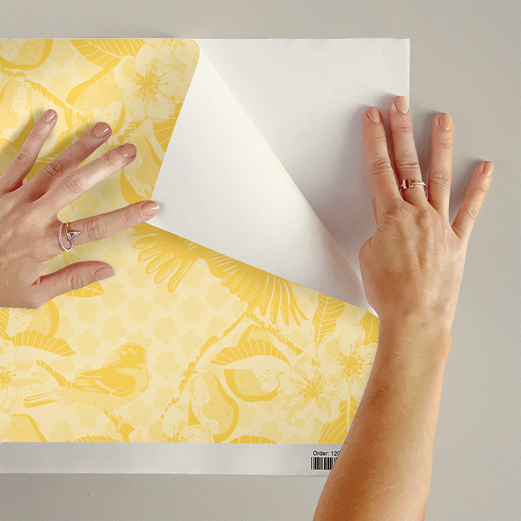 The artwork showcases a vibrant and detailed pattern featuring three orange and black birds set against a backdrop of yellow pears, green leaves, and white blossoms. The birds are depicted in different poses: one perched on a branch, one in mid-flight with wings spread, and another near a pear. The rich colors and intricate details of the feathers, fruits, and flowers create a lively and harmonious composition. The overall style combines naturalistic elements with a decorative, repeating design, highlighting the beauty of nature with emphasis on bold contrasts and vivid hues.