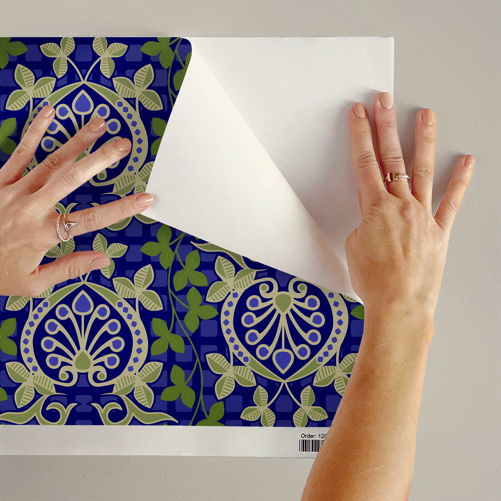 Pomegranate is a seamless repeating pattern featuring stylized heart-shaped floral motifs. Each motif has a central symmetrical design with curling tendrils and small circular shapes radiating from a rounded base. Surrounding these heart-shaped forms are pale green leaves and vines that interlock smoothly, creating an intricate lattice effect. The background is a deep blue, enriched by a subtle checkerboard texture that adds depth and contrast. The overall composition is balanced and harmonious, with elegant curves and a vintage aesthetic reminiscent of traditional textile designs. The dominant colors are dark blue, olive green, and muted beige, highlighting the natural and ornamental qualities of the pattern.