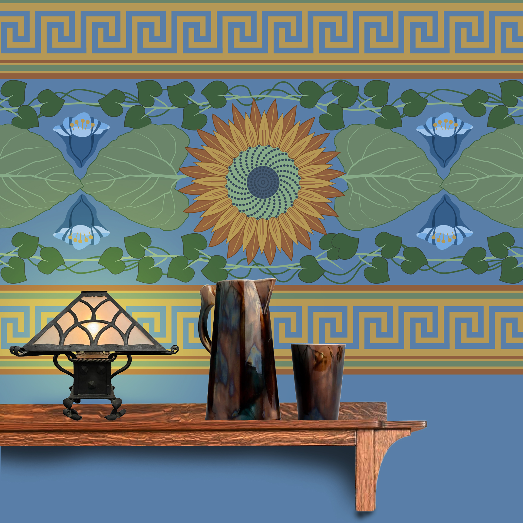 The artwork is a decorative pattern featuring a central sunflower with brown petals and a green and blue spiraled center. Surrounding the sunflower are large green leaves and a symmetric arrangement of blue flowers with rounded petals. Green vines with heart-shaped leaves intertwine around the floral elements. The design is bordered at the top and bottom by horizontal bands of Greek key motifs in gold on a blue background. The overall color palette includes shades of blue, green, brown, and gold, creating a harmonious and balanced composition. The wallpaper design is shown behind a Mission style shelf.