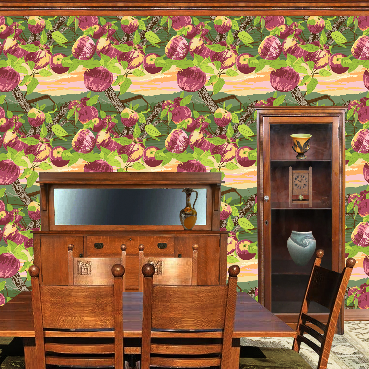 The artwork is a vibrant and stylized depiction of a peach tree with multiple ripe peaches hanging from its branches. The peaches are rendered in shades of pink, purple, and cream, with green leaves surrounding them. The tree trunks and branches are detailed with textured bark in shades of brown. The background features a layered landscape in green hues with a sunset sky colored in gradients of orange, pink, and yellow. The wallpaper design is shown in a Mission style dining room.