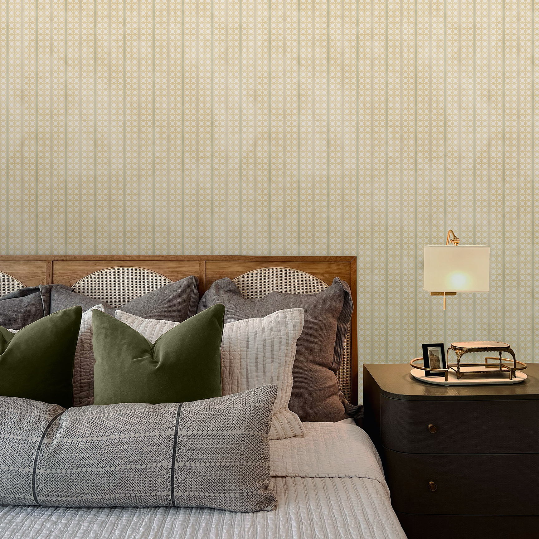 The artwork is a geometric composition featuring a symmetrical design dominated by diagonal stripes in shades of tan, rust and green. The central area is divided into four quadrants by two intersecting dark purple bands. Each quadrant contains diagonal stripes that create a chevron pattern, alternating between lavender and green hues. Vertical bands with circular motifs in black frame the central quadrants on the left and right sides. The outer edges are decorated with semicircular and triangular shapes, adding contrast with bold green and white patterns.The interplay of pastel colors and geometric forms gives the artwork a structured yet visually engaging appearance..