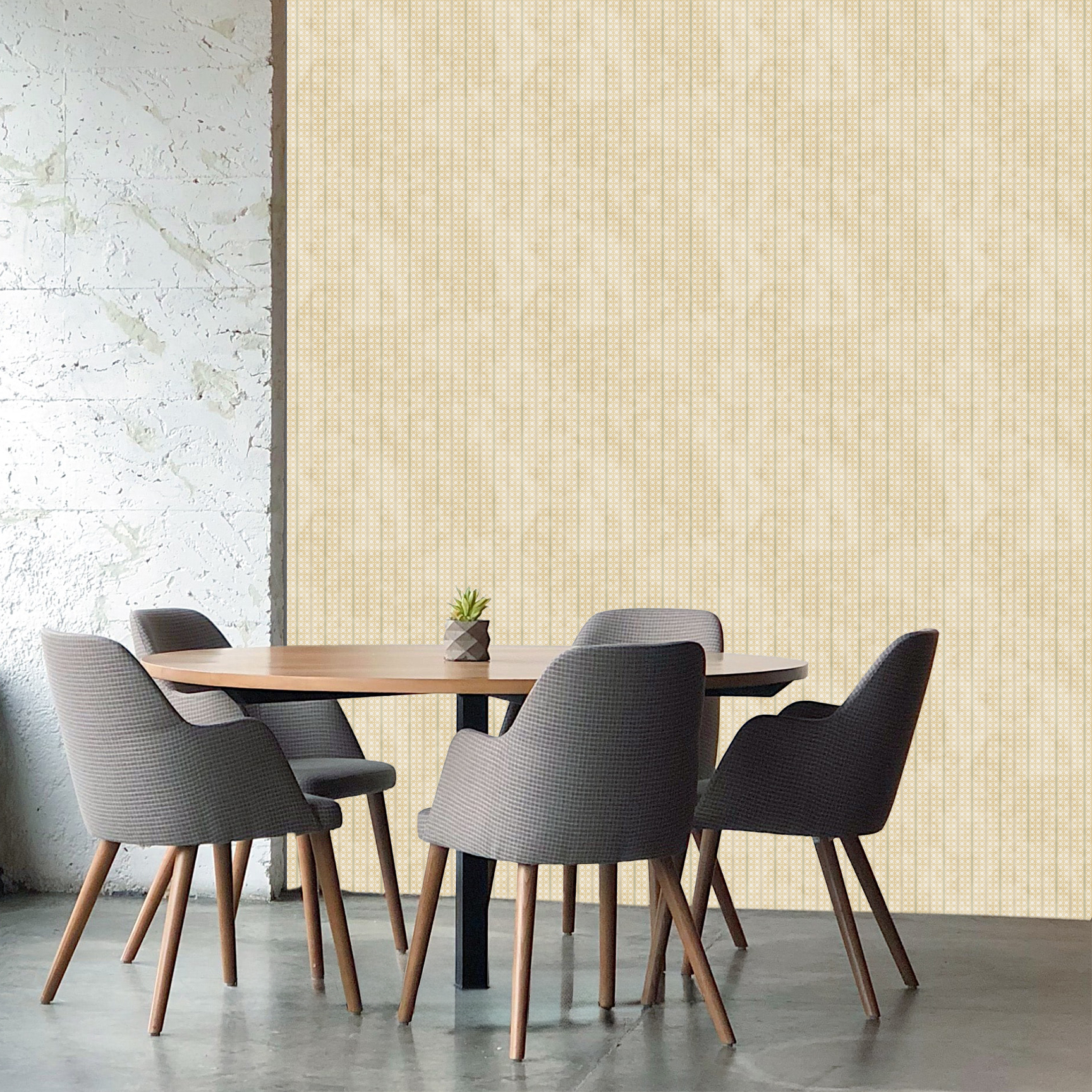 The artwork is a geometric composition featuring a symmetrical design dominated by diagonal stripes in shades of tan, rust and green. The central area is divided into four quadrants by two intersecting dark purple bands. Each quadrant contains diagonal stripes that create a chevron pattern, alternating between lavender and green hues. Vertical bands with circular motifs in black frame the central quadrants on the left and right sides. The outer edges are decorated with semicircular and triangular shapes, adding contrast with bold green and white patterns.The interplay of pastel colors and geometric forms gives the artwork a structured yet visually engaging appearance.