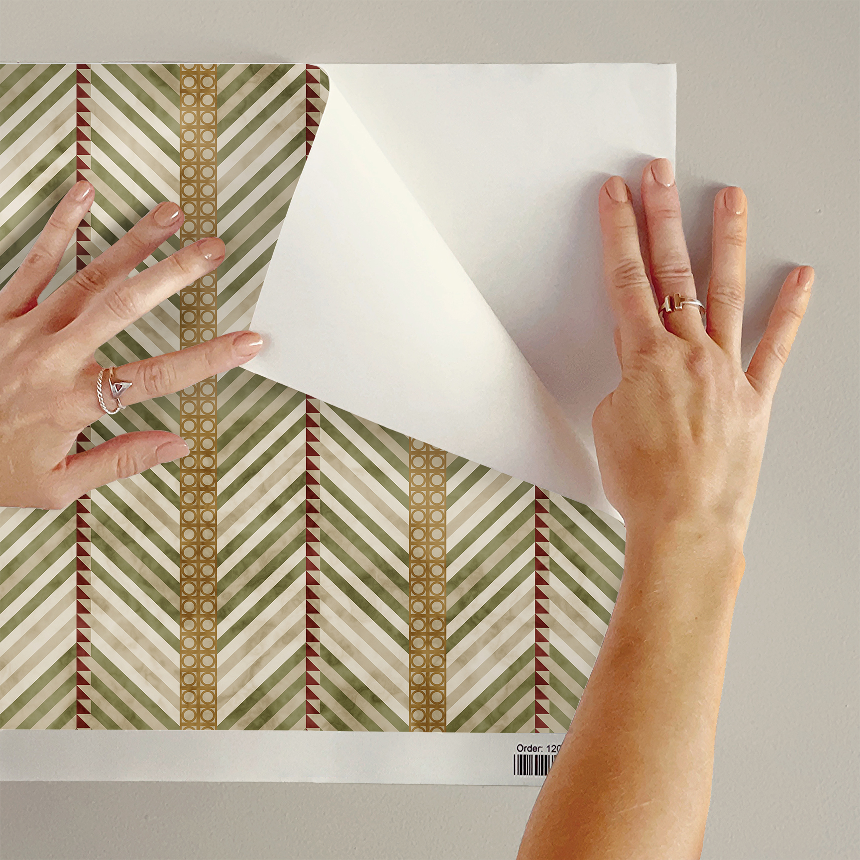 The artwork is a geometric composition featuring a symmetrical design dominated by diagonal stripes in shades of tan, rust and green. The central area is divided into four quadrants by two intersecting dark purple bands. Each quadrant contains diagonal stripes that create a chevron pattern, alternating between lavender and green hues. Vertical bands with circular motifs in black frame the central quadrants on the left and right sides. The outer edges are decorated with semicircular and triangular shapes, adding contrast with bold green and white patterns.The interplay of pastel colors and geometric forms gives the artwork a structured yet visually engaging appearance.