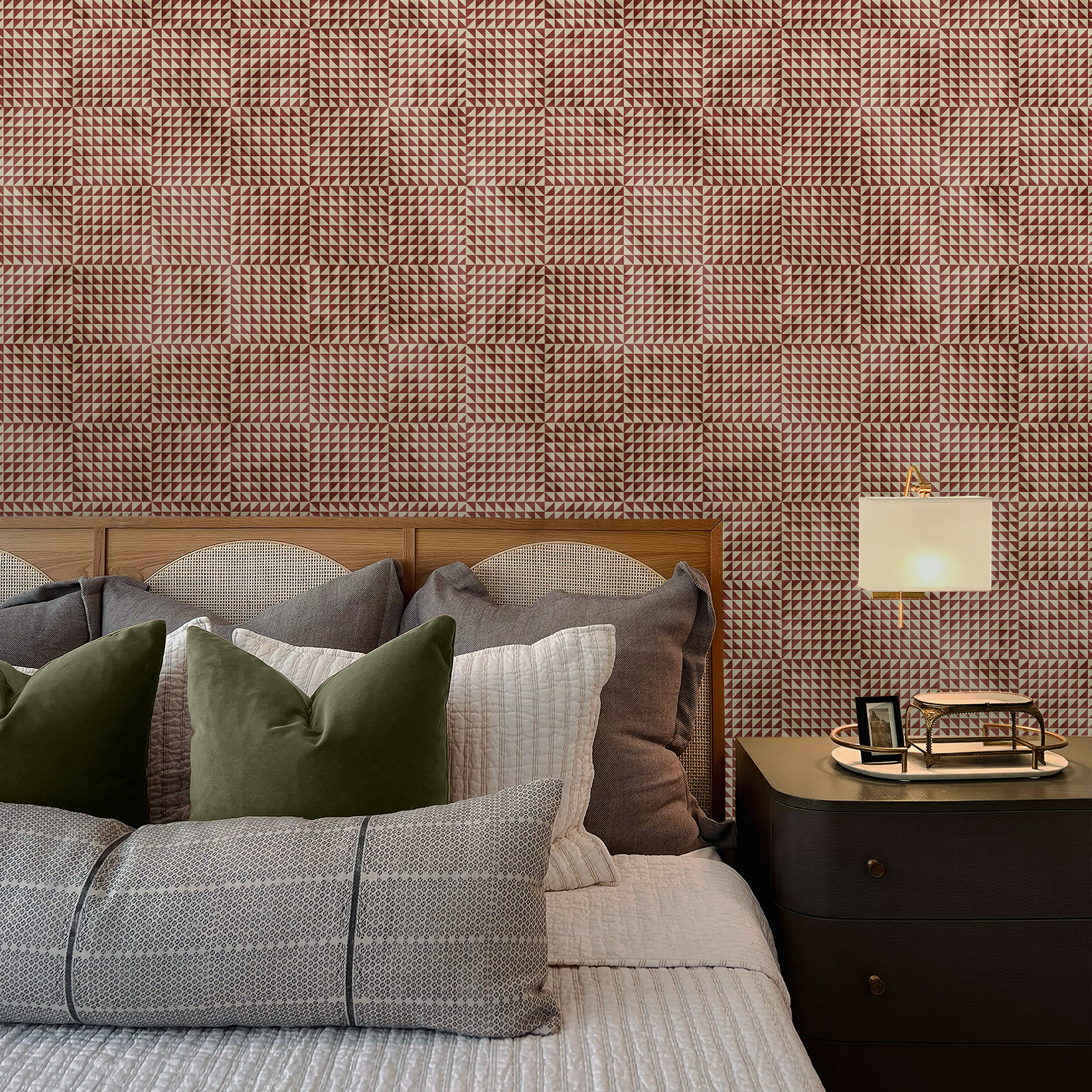 The artwork is a geometric composition featuring a symmetrical design dominated by diagonal stripes in shades of tan, rust and green. The central area is divided into four quadrants by two intersecting dark purple bands. Each quadrant contains diagonal stripes that create a chevron pattern, alternating between lavender and green hues. Vertical bands with circular motifs in black frame the central quadrants on the left and right sides. The outer edges are decorated with semicircular and triangular shapes, adding contrast with bold green and white patterns.The interplay of pastel colors and geometric forms gives the artwork a structured yet visually engaging appearance..