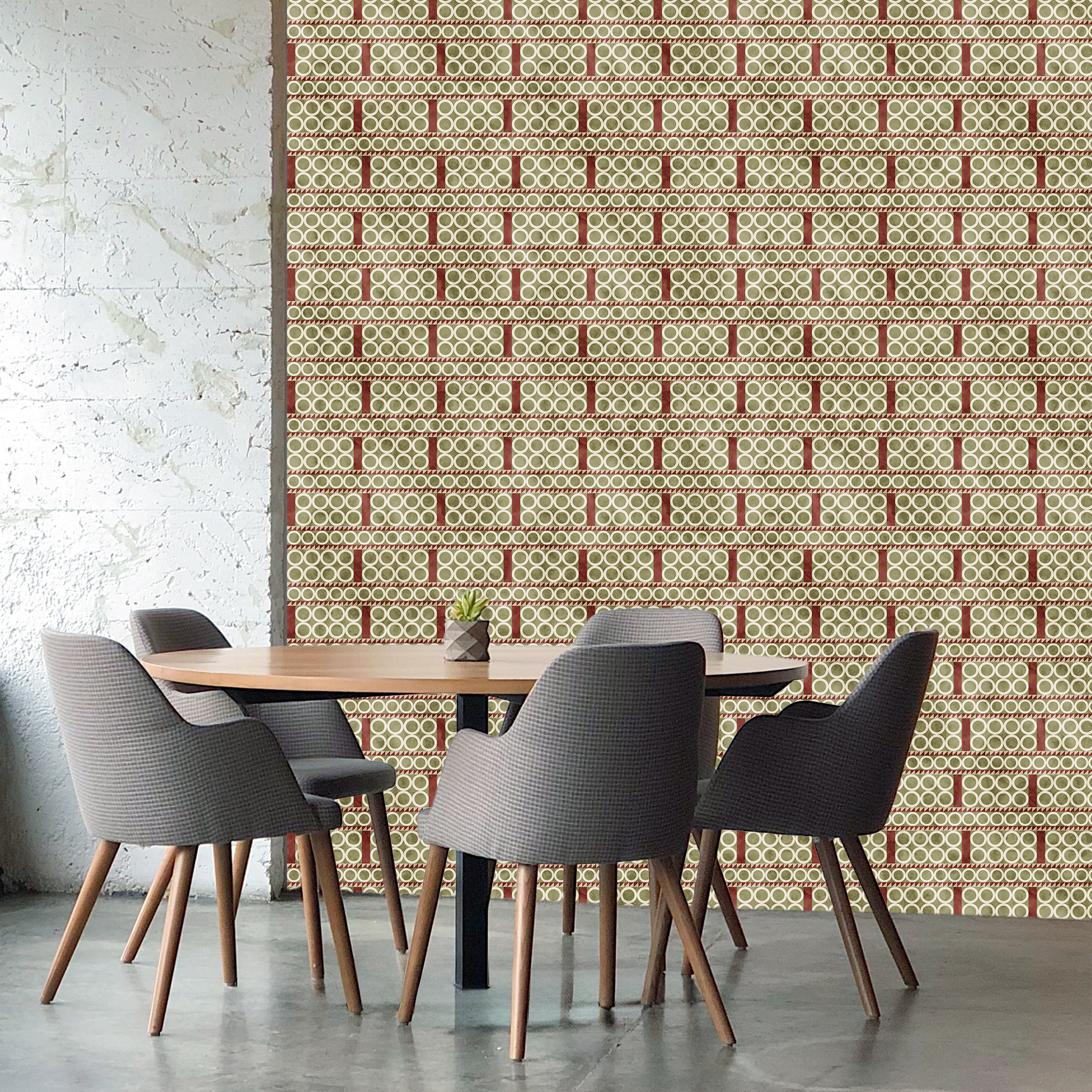 The artwork is a geometric composition featuring a symmetrical design dominated by diagonal stripes in shades of tan, rust and green. The central area is divided into four quadrants by two intersecting dark purple bands. Each quadrant contains diagonal stripes that create a chevron pattern, alternating between lavender and green hues. Vertical bands with circular motifs in black frame the central quadrants on the left and right sides. The outer edges are decorated with semicircular and triangular shapes, adding contrast with bold green and white patterns.The interplay of pastel colors and geometric forms gives the artwork a structured yet visually engaging appearance.