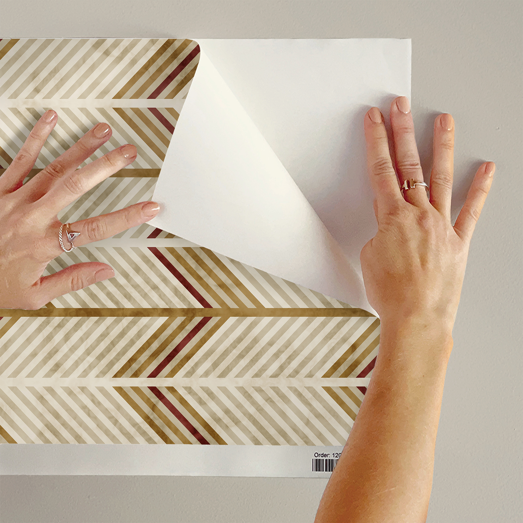 The artwork is a geometric composition featuring a symmetrical design dominated by diagonal stripes in shades of tan, rust and green. The central area is divided into four quadrants by two intersecting dark purple bands. Each quadrant contains diagonal stripes that create a chevron pattern, alternating between lavender and green hues. Vertical bands with circular motifs in black frame the central quadrants on the left and right sides. The outer edges are decorated with semicircular and triangular shapes, adding contrast with bold green and white patterns.The interplay of pastel colors and geometric forms gives the artwork a structured yet visually engaging appearance.